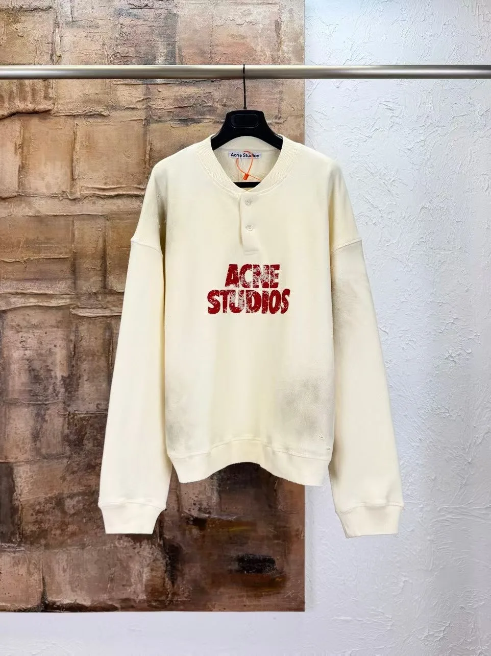 Acne Studios Logo Distressed Cotton Fleece Henley Sweatshirt (White)